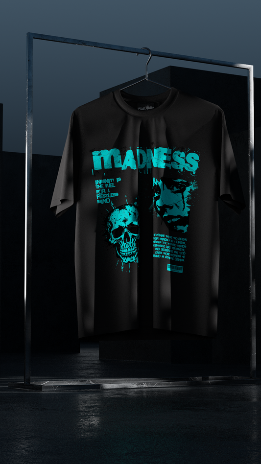 Black t-shirt with blue graphic design on a hanger against a dark background