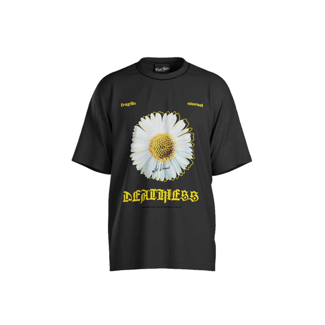 Black t-shirt with a white flower graphic and yellow text on a white background