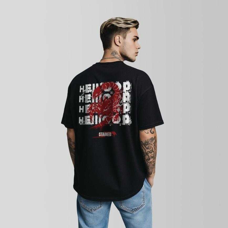 Person wearing a black t-shirt with a graphic design 'HELLMODE' on the back against a gray background by coldrelics