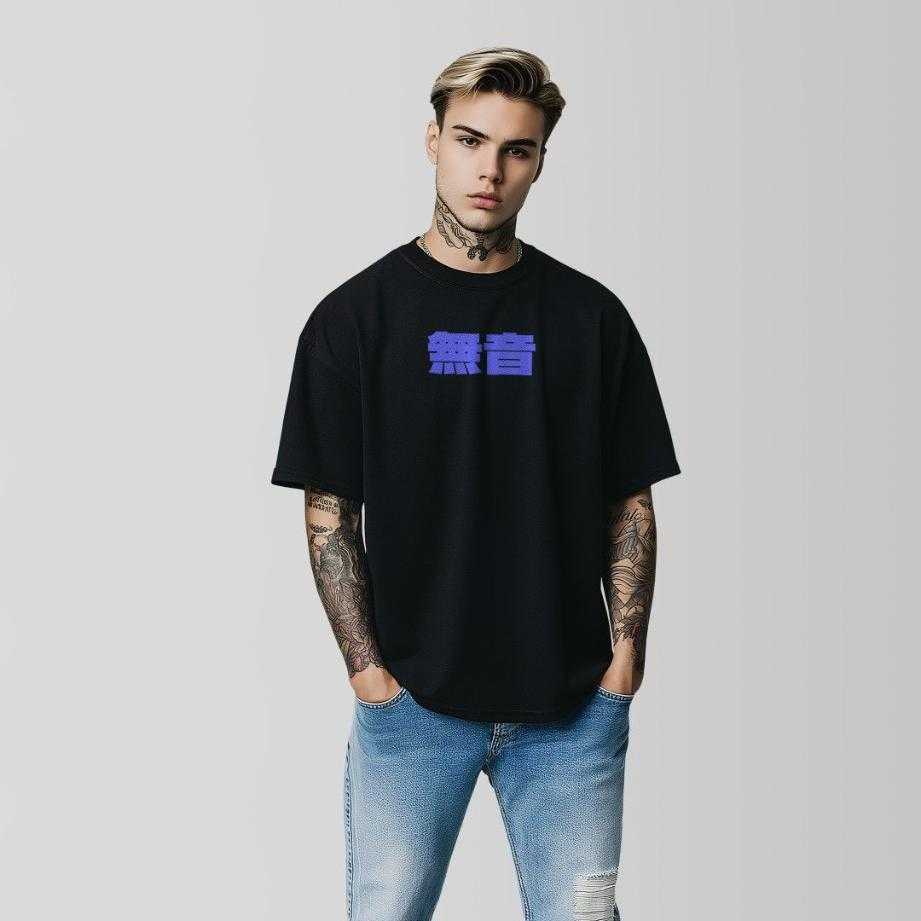 Person wearing a black t-shirt with a purple  logo and light blue jeans on a gray background by coldrelics